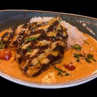 Thai Coconut Curry Chicken · lemongrass, ginger & garlic marinated chicken breast, jasmin rice, panang coconut curry sauce