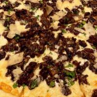 Mushroom Truffle Pizza · Mushrooms, shaved parmesan