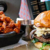 The Impossible™ Burger · delicious plant-based burger, arugula, tomato jam, peppered mushroom, truffle aioli, parmesa...