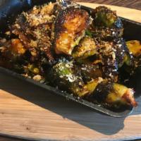 Spicy Brussels Sprouts · Kimchi, bacon, and citrus gremolata.