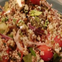 Red Quinoa Salad · Cucumber, red onion, cherry tomatoes, valbreso feta, mint, parsley, and lemon vinaigrette.