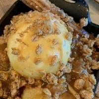 Caramel Apple Crumble · gingered apples, topped with buttery crisp cinnamon crumble, served warm with caramel drizzl...