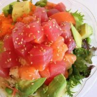 Charlie'S Salad · Mix salad, tuna and salmon, crab mix, seaweed salad, masago, cucumber, avocado, tomato, edam...