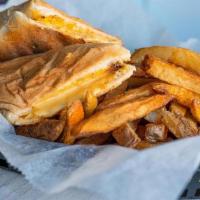 Kid'S Grilled Cheese Po Boy · New Orlean's french bread smothered with cheddar cheese