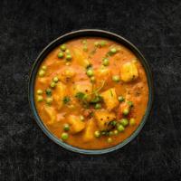 Soulful Peas & Potatoes (Vegan) · Peas and potatoes, simmered to perfection in an onion, tomato and Indian whole spice curry
