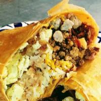 Time To Eat Signature - The Montana Mega · This one-pound burrito is loaded with all the meat choices, both cheddar and pepper jack che...