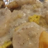 Biscuit & Gravy Bowl · An all-time favorite. Homemade sausage gravy poured over scrambled eggs, seasoned hash brown...