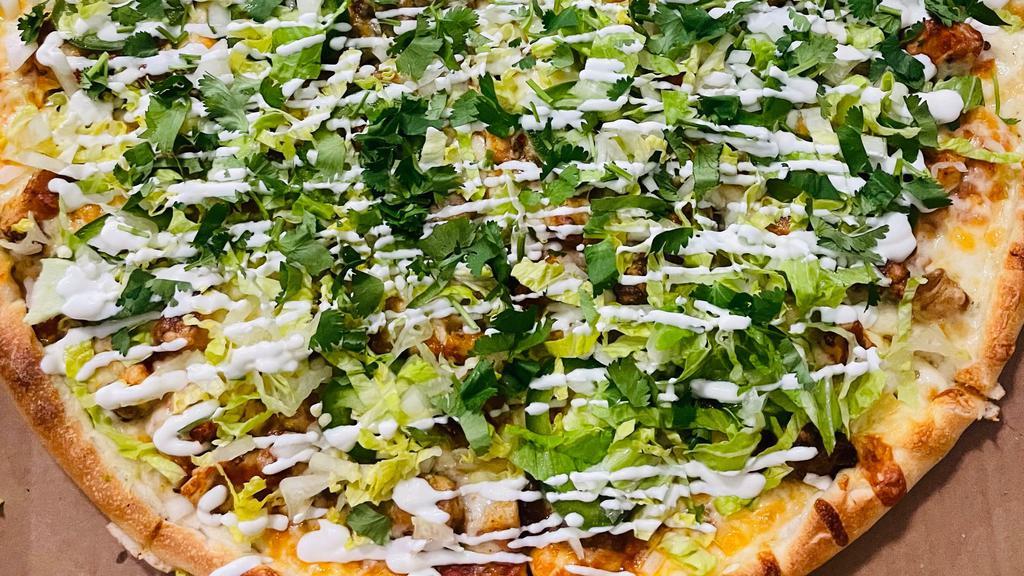 Tacos Pizza · Chicken, salsa, jalapeños, lettuce, onion, cilantro and on side sour cream.