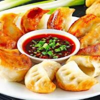 Potstickers (Kyoza) · Deep-Fried Chicken Meat Dumplings Served with Soy Sauce.