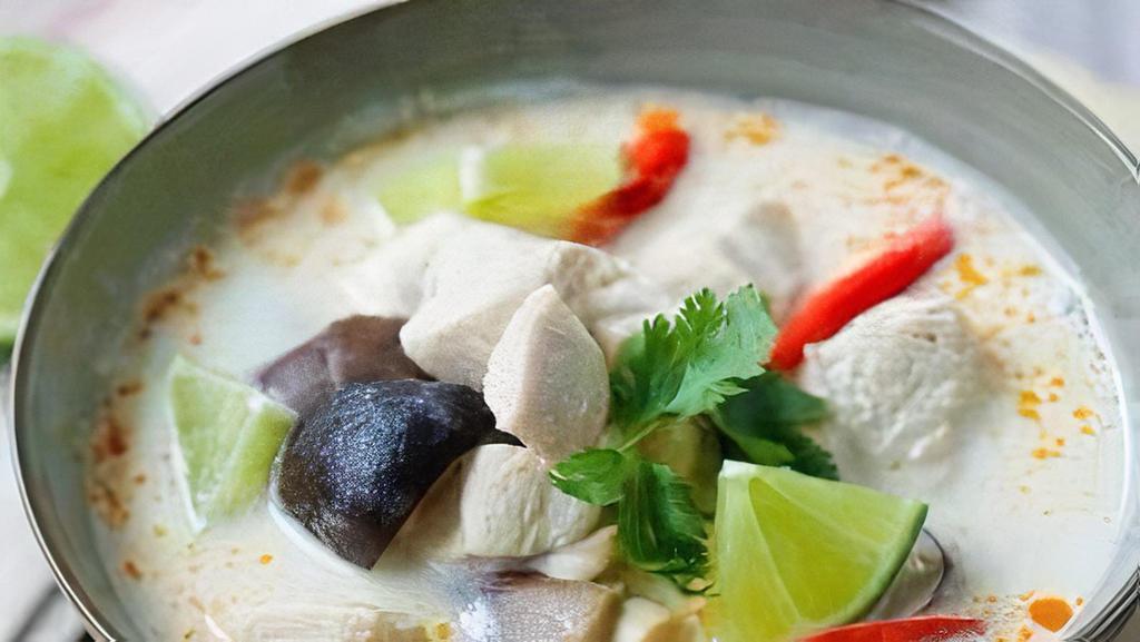 Tom Kha (Coconut Soup) · Coconut Milk based soup with Kaffir Lime leaves, Galangal, Lemongrass, Mushrooms, Onions, and Cilantro.