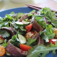 Beef Salad · Red Onions, Cilantro, Green Onions, Tomato, Carrots, Lemongrass, Lime, Cucumbers, Mixed Gree...