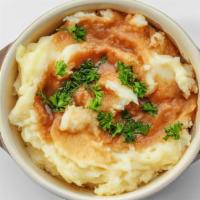Loaded Mashed Potatoes · Real Mashed potatoes prepared with buttercream, chopped bacon, and cheddar cheese, topped wi...