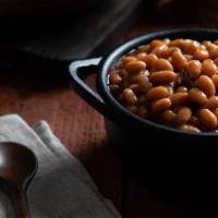 Bbq Beans With Bacon · Smoked bacon slow-simmered in a sweet BBQ sauce with tender beans and a blend of spices.