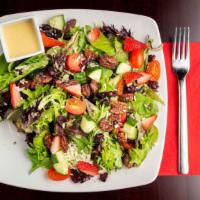 Strawberry Fields Salad · Field greens, cayenne pecans, dried cranberries, strawberries, cucumbers, tomatoes & asiago ...
