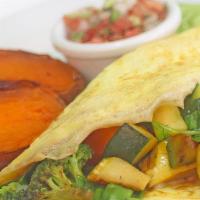 Veggie Omelette · Seasonal steamed veggies and mozzarella inside a fluffy omelette topped with homemade pico d...