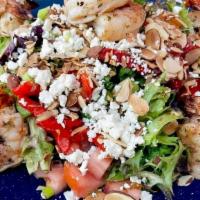 Grilled Shrimp Salad · field greens, romaine, tomatoes, feta, green onions, bell peppers, roasted almonds, balsamic...