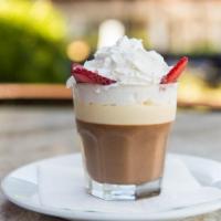 Budino · chocolate ganache, vanilla sauce, whipped cream, strawberries