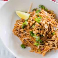Pad Thai (G/V) · Wok tossed thin rice noodles, tamarind-fish sauce, egg omelet, scallion, red onion, peanuts,...