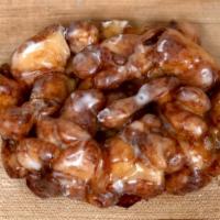 Apple Fritter · chopped dough diced apple dusted with cinnamon fried and glazed...bomb