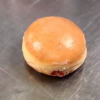 Filled Donuts · round and glazed and filled with raspberry, bavarian cream or lemon