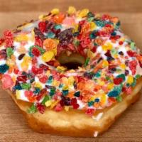 Cereal Donut · raised donut with white icing and topped with fruity pebbles cereal