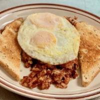 Corned Beef Hash & Eggs Breakfast · Two eggs cooked to order, served with a toast or biscuit.