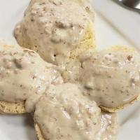 Biscuits And Sausage Gravy · Fresh baked biscuits smothered with country style sausage gravy