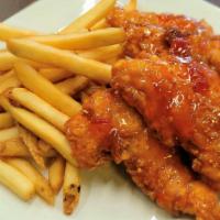 Sweet Chili Chicken Tenders & Fries Combo · Four chicken tenders tossed with sweet chili sauce (spicy) served with a heaping order of fr...