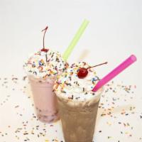 Vanilla Milkshake (20 Oz) · Vanilla soft serve ice cream blended  topped with whip cream and a cherry
