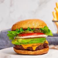 Spring It Back Burger · Plant-based impossible patty grilled and topped with vegan cheese, avocado, caramelized onio...