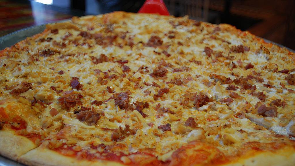 Chicken Bacon Ranch Pie · Bacon is as American as baseball and apple pie. So why not add it to your Spicy Pie pizza as well? Our Chicken Bacon Ranch comes with shredded chicken, crispy bacon, and creamy ranch. It’s perfect for the bacon lover, or any pizza lover.