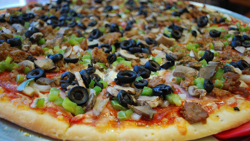 Supreme Pie · Want a pizza that has it all? Your Supreme Pizza from Spicy Pie comes loaded with the best ingredients of pepperoni, Canadian bacon, sausage, green peppers, mushrooms, onions, and black olives. You can also have it all, and have it delivered to your home.