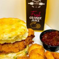 Spicy Fried Chicken On Jalapeño Biscuit  · Spicy marinated chicken thighs deep fried golden brown and served on a freshly baked fluffy ...