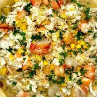Small Seafood Pot Pie · Seafood fest in a pie! Lobster tail, lump crab, Argentine shrimp, corn, potatoes and a spicy...