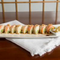 Lion King Roll · Smoke salmon cc cucumber avocado crunch soy wrap seared salmon &white fish on top served eel...