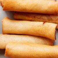 Crispy Pork Spring Rolls · Hand-rolled savory crispy pork lumpia with side house-made sweet chili sauce (8 pieces)