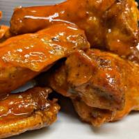 Crispy Chicken Wings · Served with Celery, Ranch or Bleu Cheese Dressing. Choose from Buffalo, BBQ, Nashville Hot S...