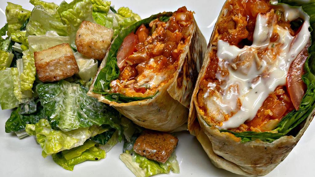 Buffalo Chicken Wrap · Lettuce, Tomato, Onion, Cheddar Cheese, Ranch and One Side of Choice.