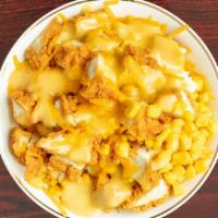 Southern Country Bowl · Buttery mashed potatoes topped with fried chicken, sweet corn, gravy, and Cheddar cheese.