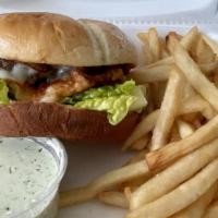 Spicy Fried Chicken Burger · Spicy chicken burger with lettuce, tomato, and onion.