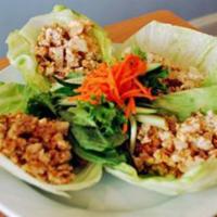 Chicken Lettuce Wraps · Sautéed minced chicken, chopped peanuts, crispy
shallots and peanut sauce. Served in lettuce...