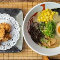 Karaage Ramen · Curly noodle with deep fried chicken, egg, fish cake, scallion, nori, bamboo shoots and wood...