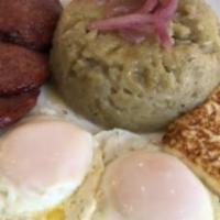 Mangu Tres Golpes · Smashed plantain, fried cheese, salami, and fried eggs.