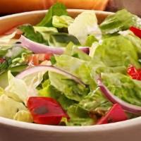 Garden Salad · Romaine lettuce, red onions, bell peppers, sliced cucumbers, olives, Roma tomatoes, red cabb...