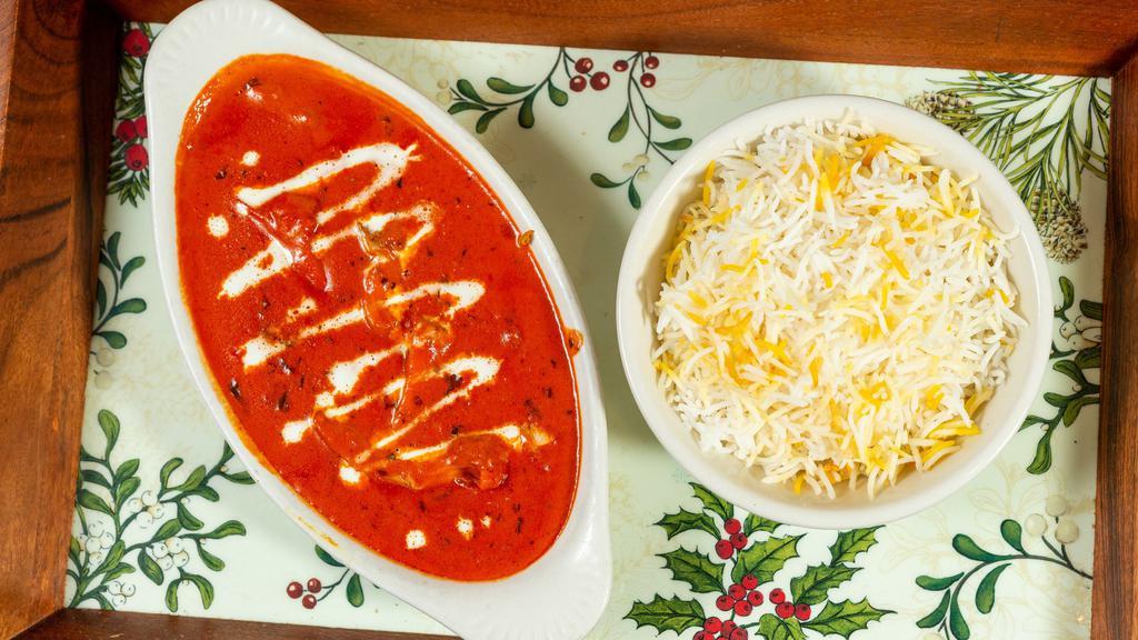 Butter Chicken · Chicken cooked with tomato based cream sauce with butter.