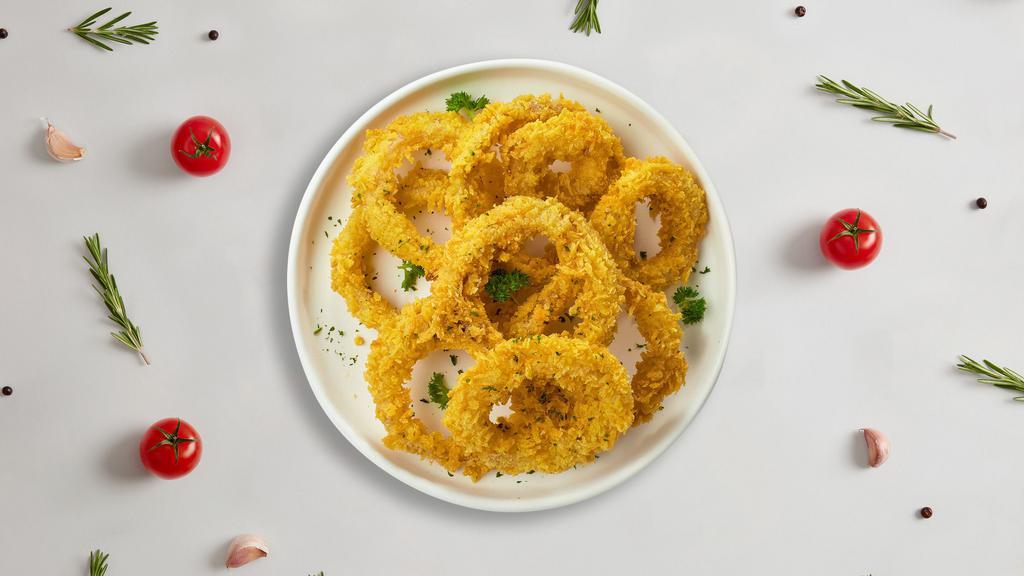 Cajun Onion Crunch · Sliced onions with cakhun dipped in a light batter and fried until crispy and golden brown.