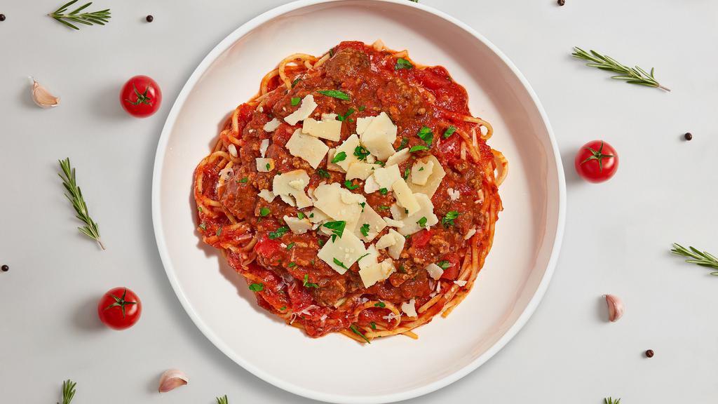 Mighty Meatier Spaghetti · Fresh spaghetti served served with a meaty red sauce and your choice of toppings.