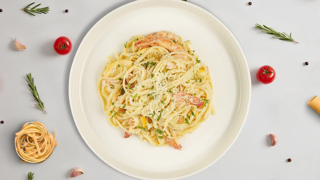 Shrimply Scampi · Fresh pasta of your choice served with fresh tomatoes sautéed with white wine and garlic. Served with a side of garlic bread.