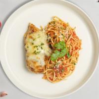 Clucking Parm Pasta · Freshly baked chicken parmesan served with rossa (red) sauce spaghetti and drizzled with par...