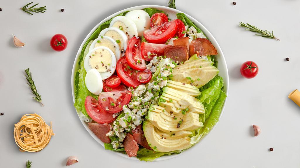 Call A Cobb Salad · Grilled chicken breast, avocado, bacon, tomato, cucumbers, hard boiled egg served over mixed greens.